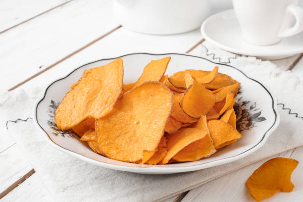istock A Malay traditional snack named Kerepek Ubi Kari. 1495042043
