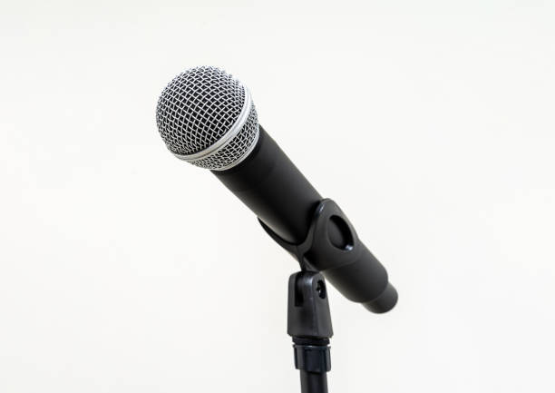 istock Microphone with stand on isolated white background for singer and speaker. Wireless microphone. High quality dynamic microphone 1495043082