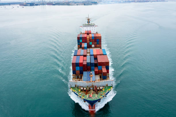 istock container ship carrying container box global business delivery service cargo by freight shipping commercial trade logistic and transportation over sea worldwide 1495043189
