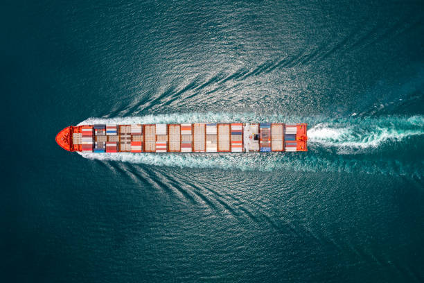istock Container ship full speed sailing in deep sea for transporting cargo logistic import and export goods internationally around the world, including Asia Pacific and Europe, business and industry delivery service transportation concept,Aerial top view 1495043217