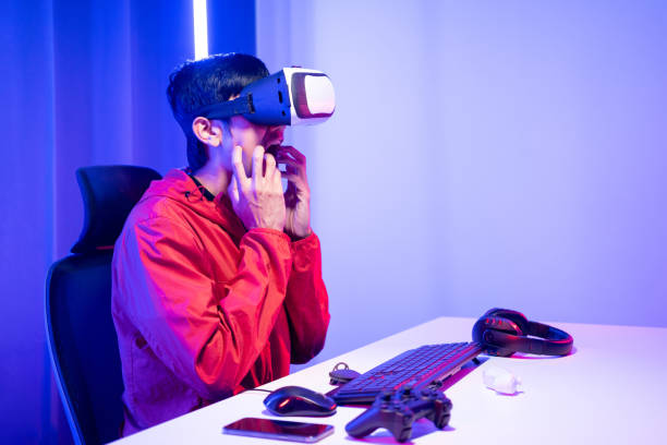 istock Young man interesting with virtual simulated world. Into the future digital cyber universe. Future technology vr concept. 1495043259