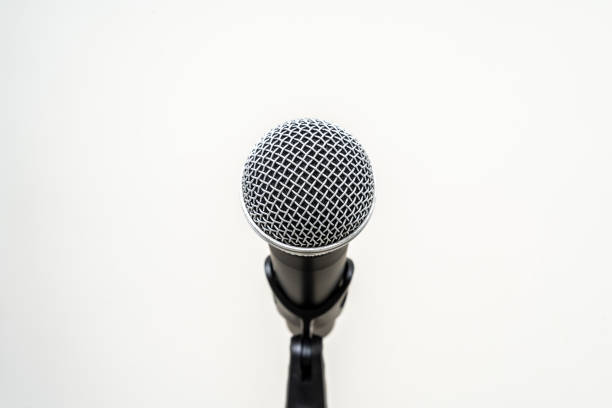 istock Microphone with stand on isolated white background for singer and speaker. Wireless microphone. High quality dynamic microphone 1495043539