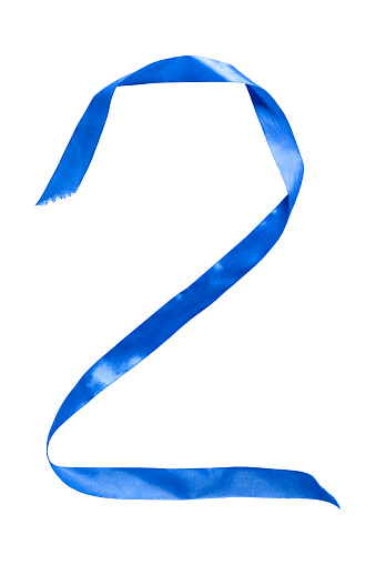 Blue ribbon folded in shape of numeral 2 isolated on white background