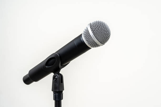 istock Microphone with stand on isolated white background for singer and speaker. Wireless microphone. High quality dynamic microphone 1495045096