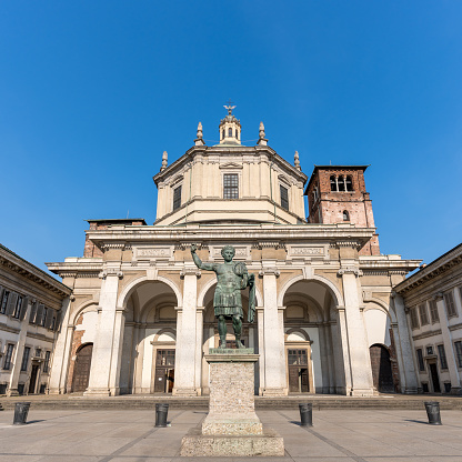 Modena, Emilia-Romagna, Italy - February 08, 2014: General view of the Alessandro Tassoni monument in front of the Ghirlandina