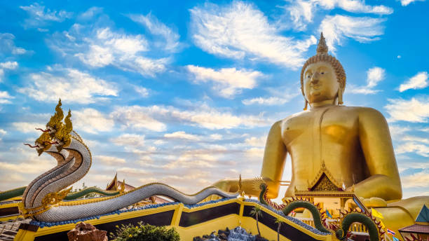 istock big golden Buddha statues with  serpent at front in ang thong Thailand 1495045546