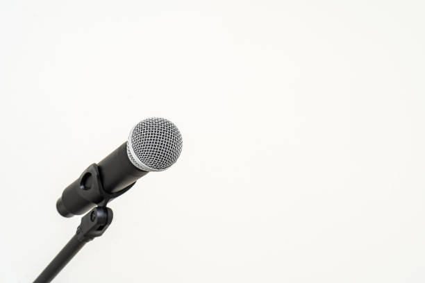 istock Microphone with stand on isolated white background for singer and speaker. Wireless microphone. High quality dynamic microphone 1495045956
