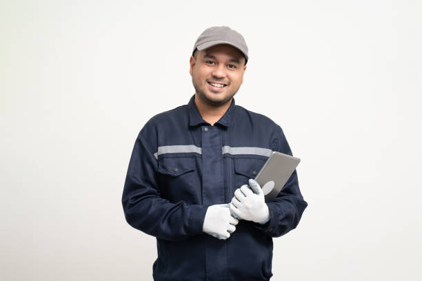 istock Technician workers in uniform maintenance service with tablet. Profession of service industry house repair. Home services isolated background. 1495046826