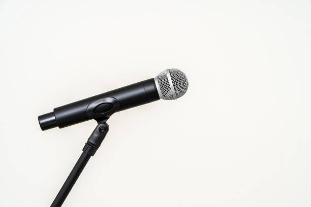 istock Microphone with stand on isolated white background for singer and speaker. Wireless microphone. High quality dynamic microphone 1495046834