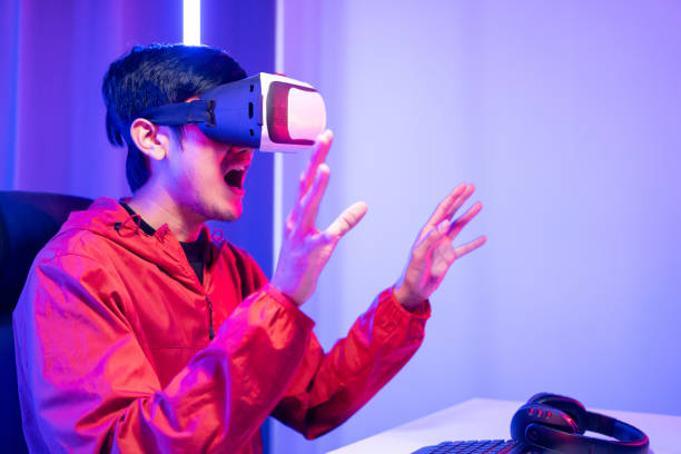 istock Young man interesting with virtual simulated world. Into the future digital cyber universe. Future technology vr concept. 1495047241