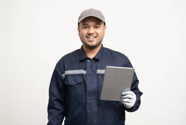 istock Technician workers in uniform maintenance service with tablet. Profession of service industry house repair. Home services isolated background. 1495047492
