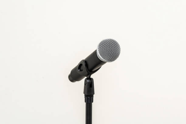 istock Microphone with stand on isolated white background for singer and speaker. Wireless microphone. High quality dynamic microphone 1495048089