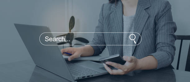 istock SEO, Search Engine Optimization concept. Young men use smartphones to find what they are interested in. Smart search, Searching information data on internet networking concept. 1495048903