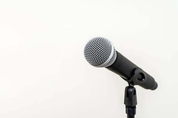 istock Microphone with stand on isolated white background for singer and speaker. Wireless microphone. High quality dynamic microphone 1495049020