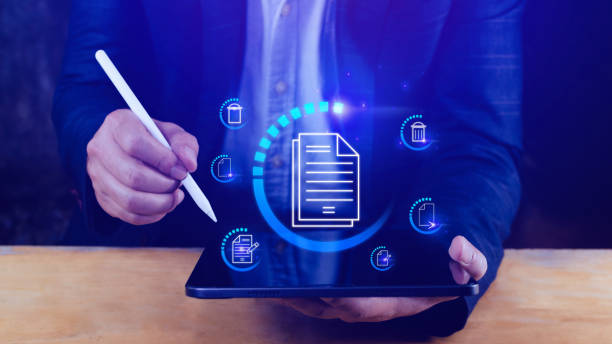 istock Businessman pressing multimedia type of modern buttons with virtual background, Document Management System (DMS), searching and managing corporate files information. 1495052907