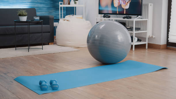 istock Empty living room with equipment used for physical exercise 1495054061