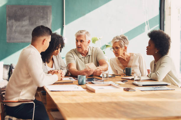 istock Strategy meeting, diversity and manager communication, discussion or conversation about design idea. Planning collaboration, teamwork and business people working, consulting or talking about project 1495054663