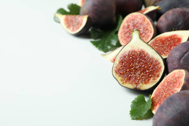 istock Fig with leaves on white background, space for text 1495055051