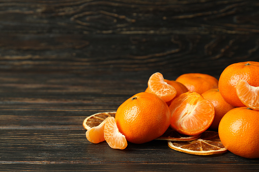 Fresh tangerines in a wicker basket, vitamin C