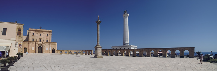 Santa Maria di Leuca, Italy. 07 02 2019. Square where the church of the Annunciation of the Blessed Virgin Mary, lighthouse and a Corinthian column are located.