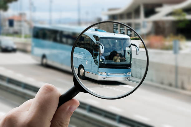 istock Magnifying glass focusing a bus 1495060653