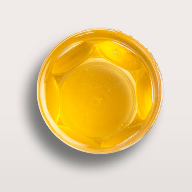 istock Bright healthy honey with flat lay concept isolated on white background. 1495061076