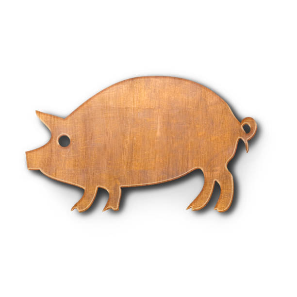 istock Close up view wooden cutting board with pig shape fit for kitchen concept. 1495061368