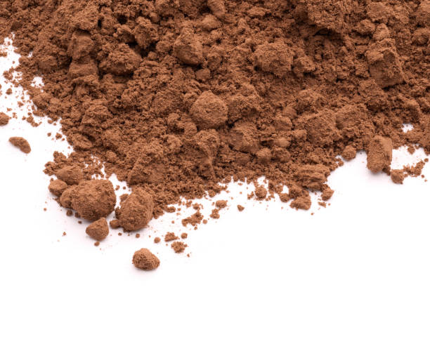 istock Pile of Cocoa powder isolated on white background. 1495076093