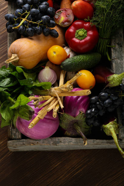 istock Organic produce in wood crate 1495078301