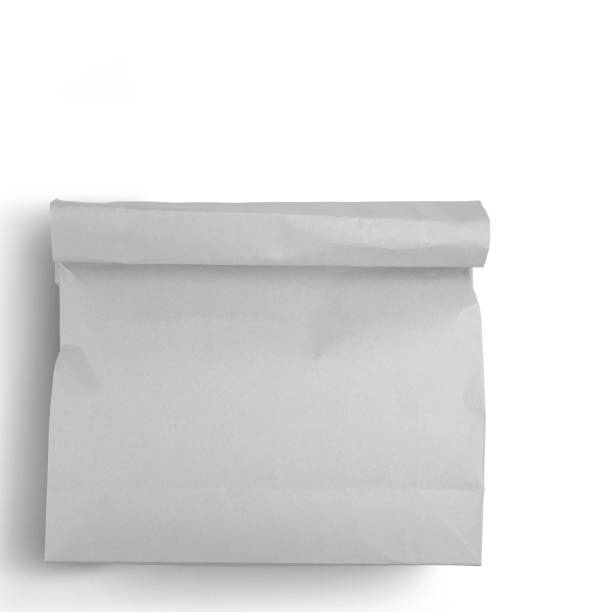 istock Classical white paper bag isolated on white background fit for your mockup design. 1495079763