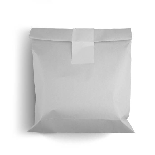 istock Classical white paper bag isolated on white background fit for your mockup design. 1495080877