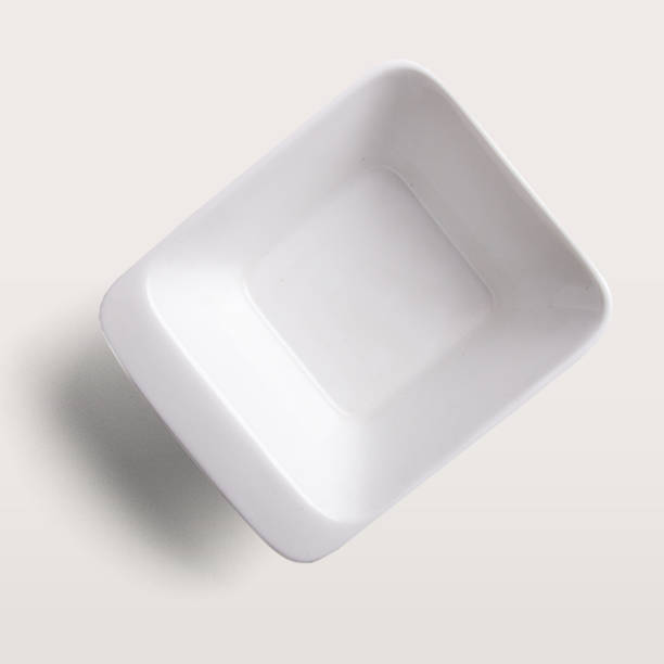 istock White bright ceramics with flat lay concept isolated on white background. 1495081334