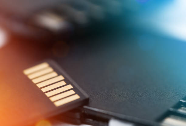 Micro sd card lies on a pile of memory cards. close-up. Micro sd card lies on a pile of memory cards. close-up. usb stick photos stock pictures, royalty-free photos & images