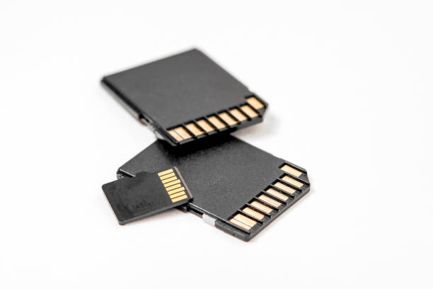 istock Close-up of black memory cards on a white background. SD memory card to use when taking pictures on your digital camera. 1495084954