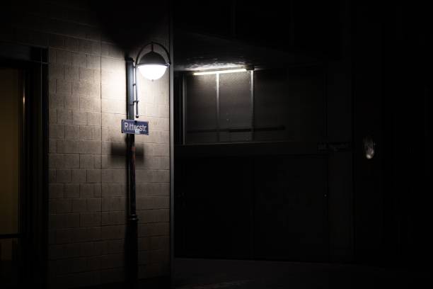 istock a dark room with a light in it, and there is an illuminated sign on 1495087601
