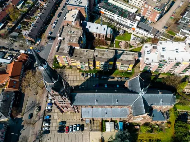 An aerial shot of a bustling, vibrant Eindhoven cityscape
