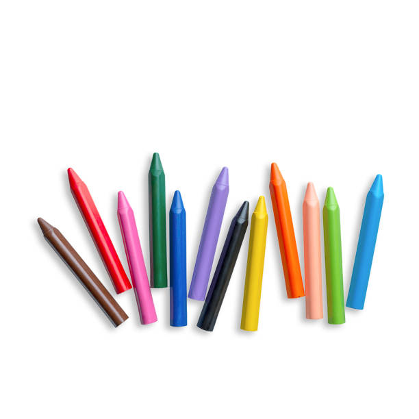 istock Multicolored Crayons and pastels lying in chaos isolated on white background 1495090522
