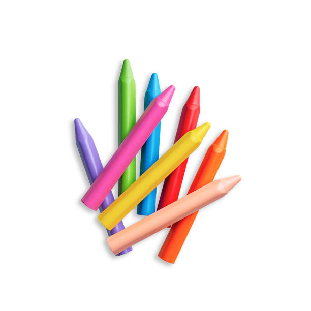 istock Multicolored Crayons and pastels lying in chaos isolated on white background 1495091423