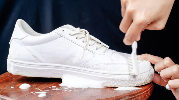 istock Cleansing foam on white leather footwear 1495092074