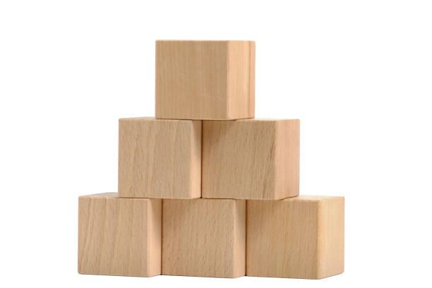Pyramid of wooden cubes white background