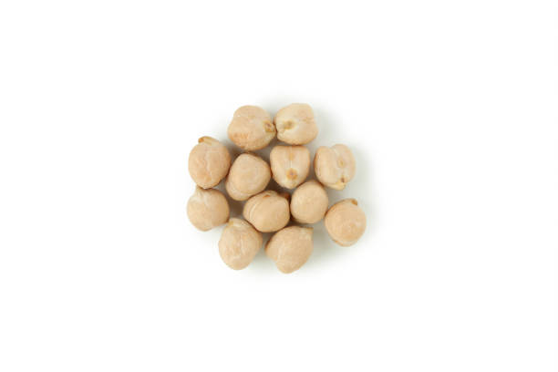 istock Handful of dried chickpea isolated on white background 1495093852