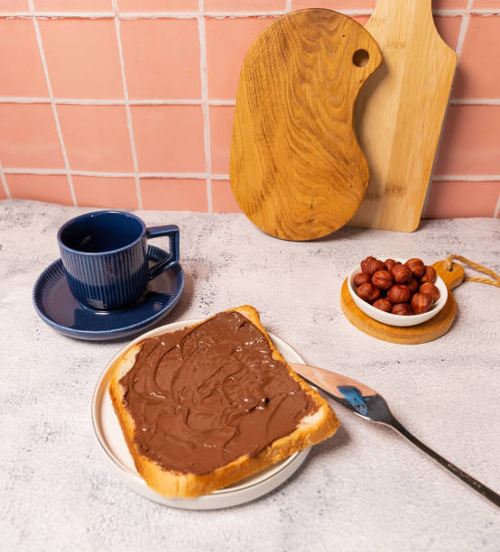 Chocolate paste on a square piece of a loaf.