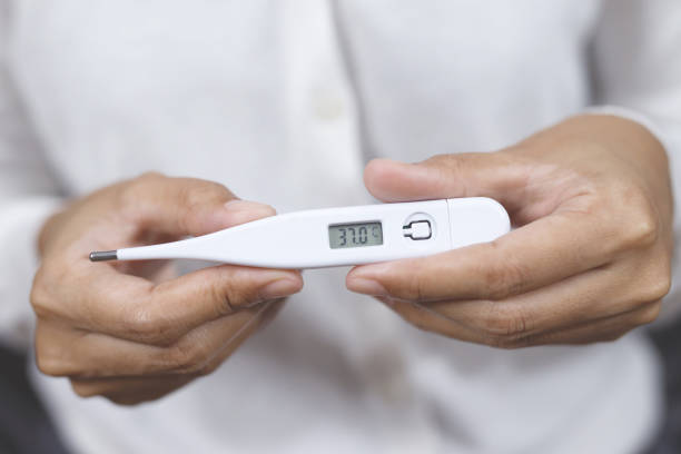 istock The patient measures body temperature heat. 1495097012