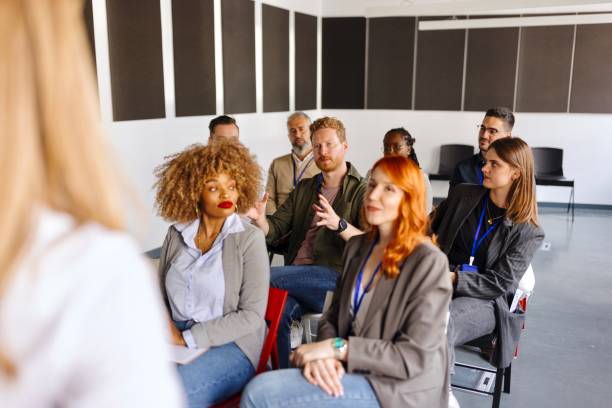 istock Multiracial people attending a business training 1495097455