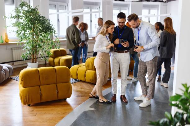 istock Group of colleagues talking about business 1495097550