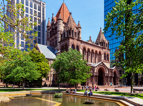 Boston, Massachusetts, USA - May 29, 2023: Trinity Church is in Copley Square in Boston's Back Bay neighborhood. It was constructed  between 1872 and 1877. It is a parish of the Episcopal Diocese of Massachusetts.
