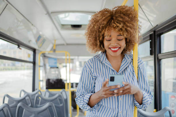 istock Passing the time with her smartphone 1495102137
