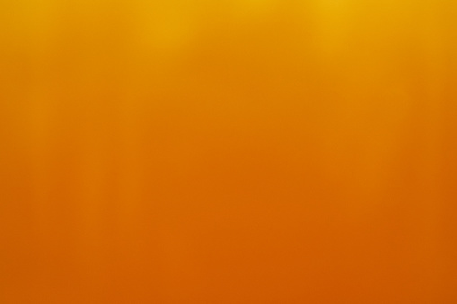 Honey macro texture background. Abstract Orange gold gradient background.