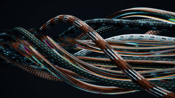 istock Tangled wires, ropes and transparent tubes move randomly on a black background. Knot, ligament, twisted. 1495107538