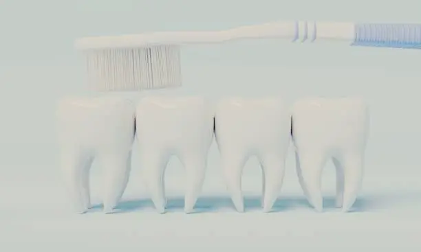 An illustration of teeth and a toothbrush on a pastel blue background
